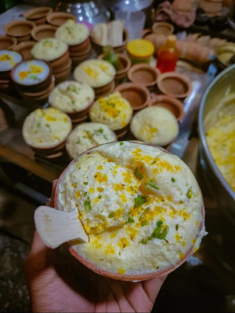 Speciality Sweet of #varanasi - MALAIYO {Price - ₹30 / 0.4$}

A sweet available on Varanasi streets only in winters, made by storing hot forth sweetened milk overnight & adding saffron & rose water flavouring in the morning. Served in a “kulhad” with Chasew nuts & Pistachio on top