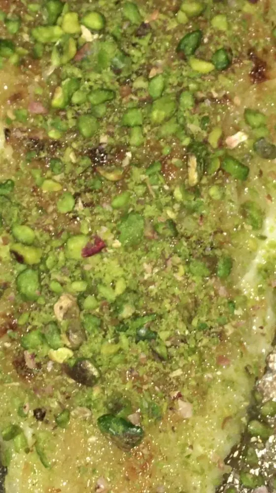 @PhotographersCorner - My pic for @Africuz’s #textures contest

This is top part of a Turkish desert called “künefe” and green material is pistachio. Picture was taken in 2019.

For further info:

https://www.giverecipe.com/kunefe-sweet-cheese-pastry/

