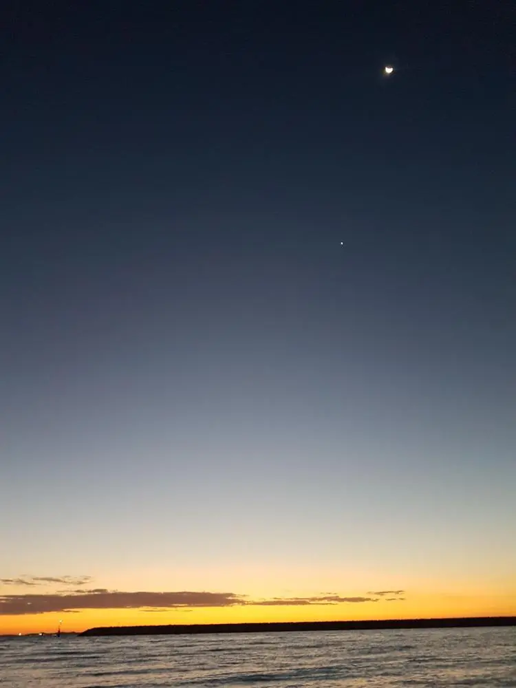 Another night shift and another sunset!
I waited until it was a little darker this time so that Venus (the little dot of light just below the moon and off to the left) was a bit more visible! 